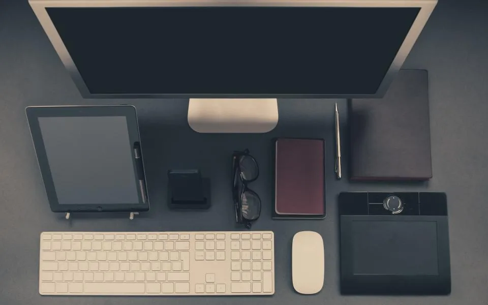 Desktop workstation with monitor, keyboard, mouse and tablet